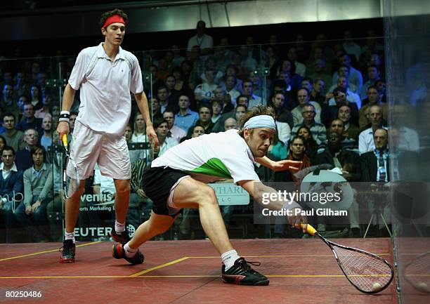 James Willstrop of England in action against Cameron Pilley of Australia during the final of the ISS Canary Wharf Squash Classic at East Winter...