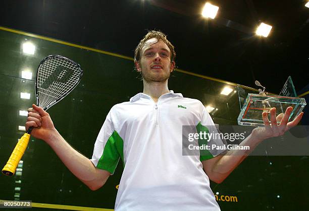 James Willstrop of England celebrates with his trophy after winning against Cameron Pilley of Australia during the final of the ISS Canary Wharf...