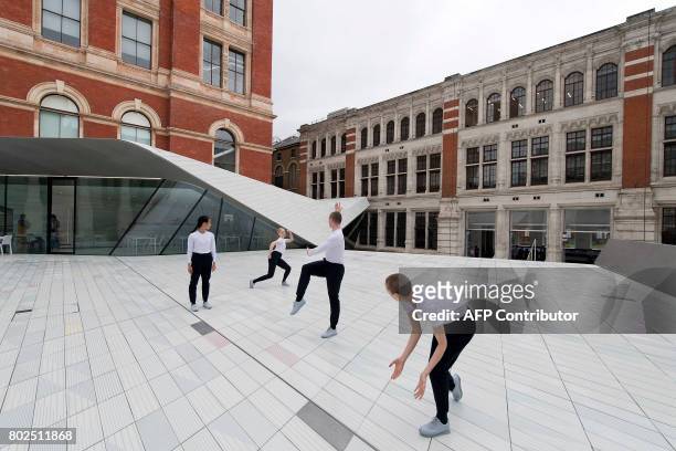 Contemporary dancers perform in the Sackler Courtyard, a new addition to the Victoria and Albert museum is unveiled to the public in London on June...