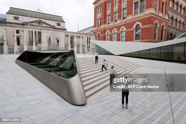 Contemporary dancers perform in the Sackler Courtyard, a new addition to the Victoria and Albert museum is unveiled to the public in London on June...