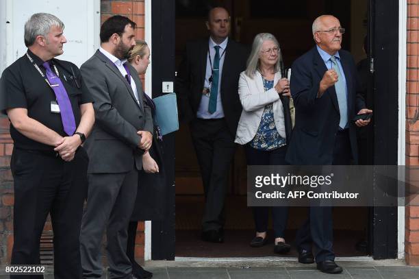 Barry Devonside, whose son Christopher died in the 1989 Hillsborough stadium disaster, exits Parr Hall with family members after being informed of...