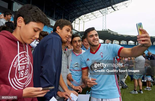 Maxi Gomez takes a selfie with fans during his presentation as a new player for Celta de Vigo at Estadio Balaidos on June 28, 2017 in Vigo, Spain.