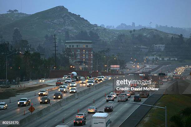 Morning rush-hour traffic moves along the 60 freeway, after Environmental Protection Agency Administrator Stephen L. Johnson this week announced a...