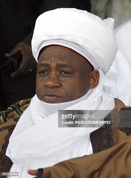 Spiritual leader of Nigeria's large Muslim community, Sultan of Sokoto, Mohamed Sa'ad Abubakar III watches events on Argungu River during the Argungu...