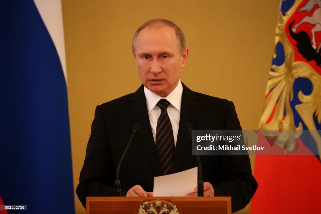 Russian President Vladimir Putin attends the reception at the Kremlin