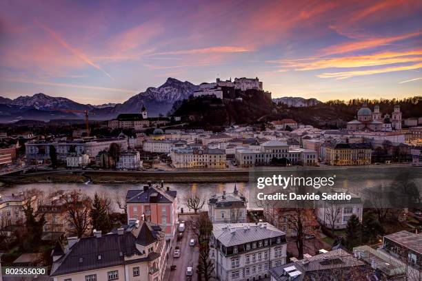 sunset on the salzburg castle - salzburg stock pictures, royalty-free photos & images