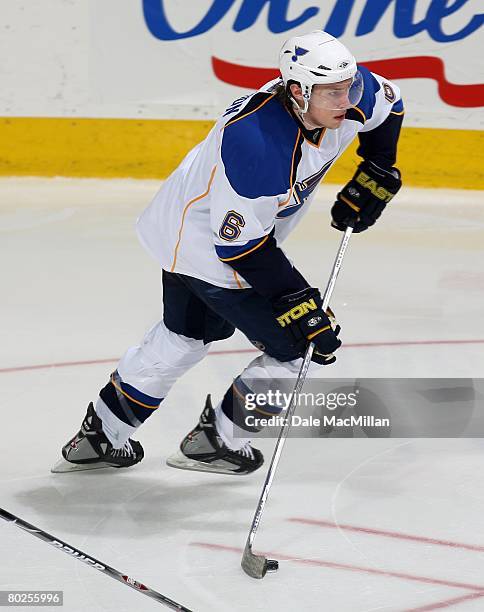 Erik Johnson of the St. Louis Blues skates against the Calgary Flames during their NHL game at Pengrowth Saddledome on March 10, 2008 in Calgary,...