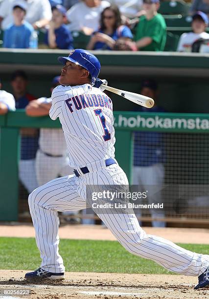 Kosuke Fukudome of the Chicago Cubs bats during a Spring Training game against the Los Angeles Angels of Anaheim at HoHoKam Park on March 14, 2008 in...