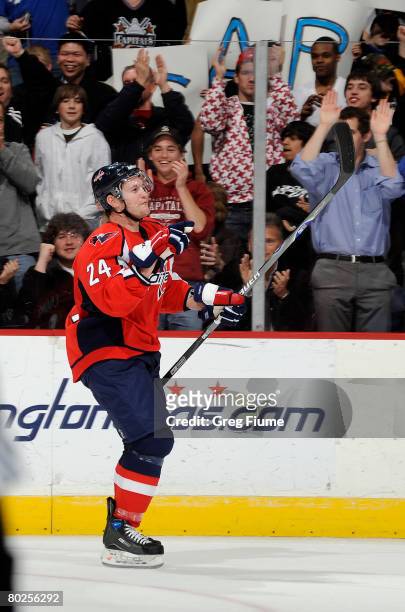 Matt Cooke of the Washington Capitals celebrates after scoring a short handed goal against the Atlanta Thrashers at the Verizon Center on March 14,...