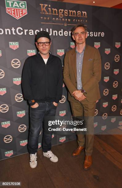 Director Matthew Vaughn and Toby Bateman, Managing Director at Mr Porter, attend the TAG Heuer Connected Modular 45 Kingsman Special Edition launch...