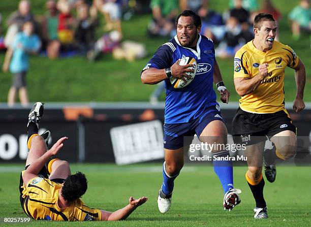 John Afoa of the Blues runs through the tackle from Troy Takiari of the Force during the round five Super 14 match between the Blues and the Western...