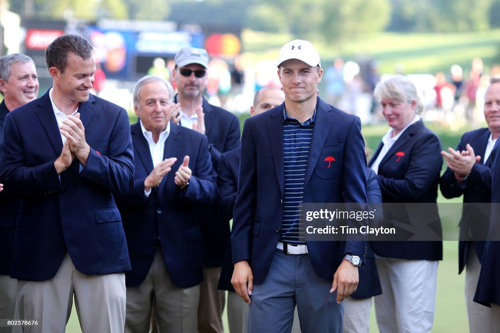Jordan Spieth wearing the winning jacket after winning the
