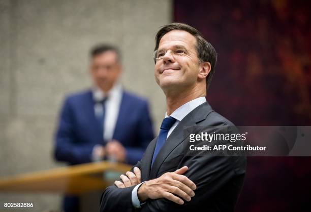 Dutch Prime Minister Mark Rutte of the VVD looks on during a debate in Parliament in The Hague on June 27 about the final report of informer Herman...