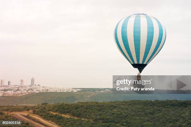 a hot air ballon color blue - leon mexico stock pictures, royalty-free photos & images