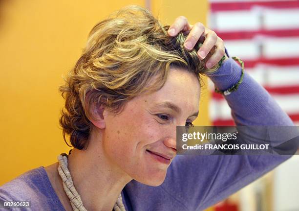 French writer Anna Gavalda gestures as she presents her book "La consolante" during the 28th Paris' Book Fair, on March 15, 2008 in Paris. Israeli...