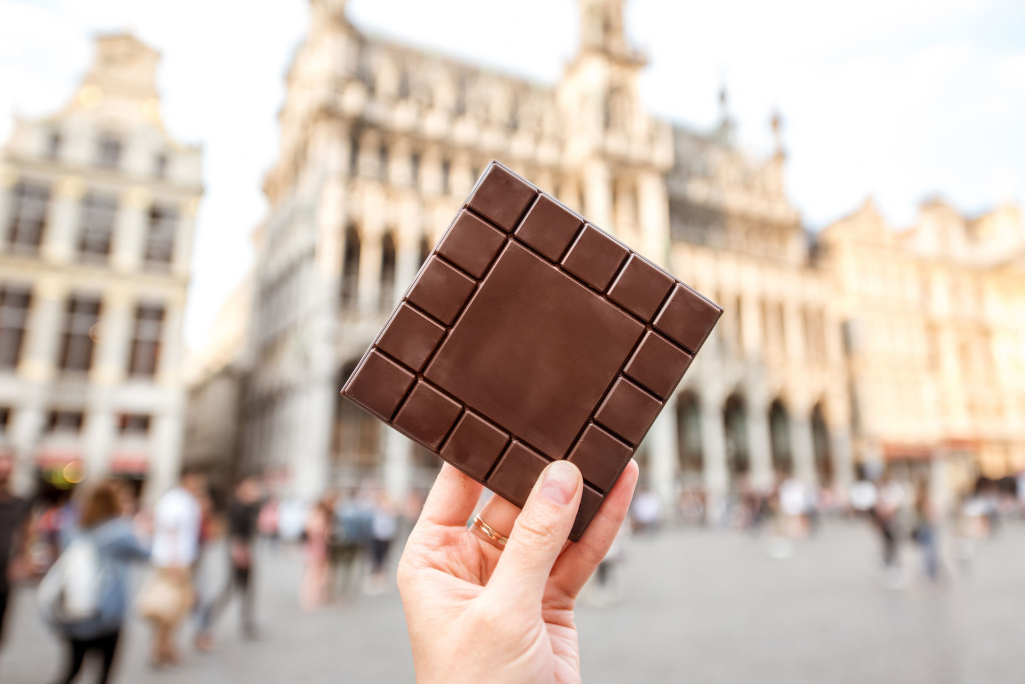 Holding a chocolate bar in Brussels Holding a chocolate bar in Brussels