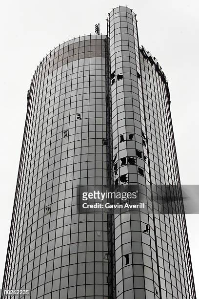 Windows at the Westin Peachtree Plaza hotel are seen damaged March 15, 2008 in downtown Atlanta, Georgia. A tornado with 130-mph winds was confirmed...