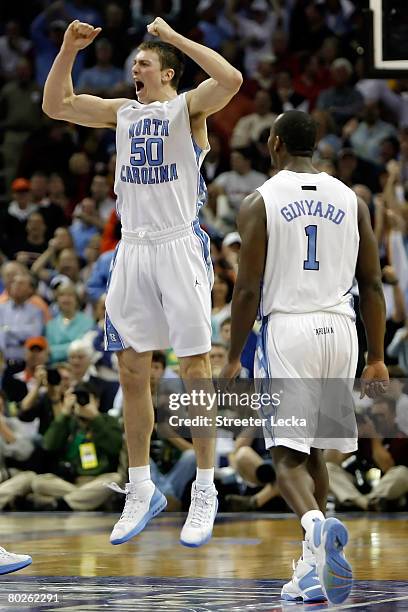 Tyler Hansbrough of the North Carolina Tar Heels reacts with teammate Marcus Ginyard after Hansbrough made the game-winning shot with .8 seconds left...