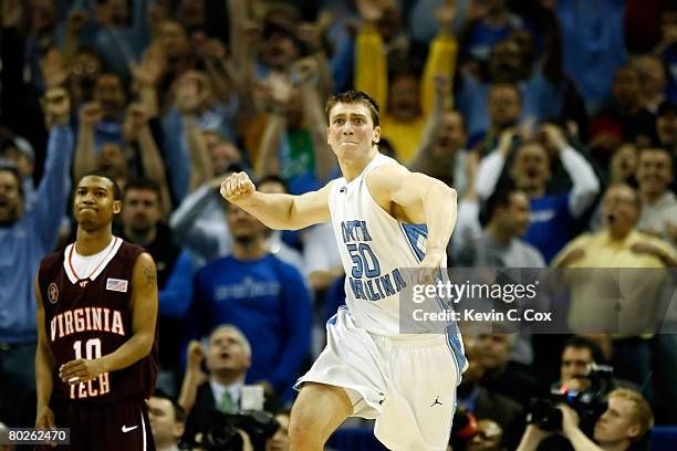 Tyler Hansbrough of the North Carolina Tar Heels reacts after making the game-winning shot with .8 seconds left as Hank Thorns of the Virginia Tech...