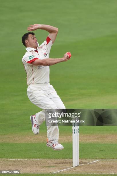 Ryan McLaren of Lancashire runs into bowl during the Specsavers County Championship Division One match between Warwickshire and Lancashire at...