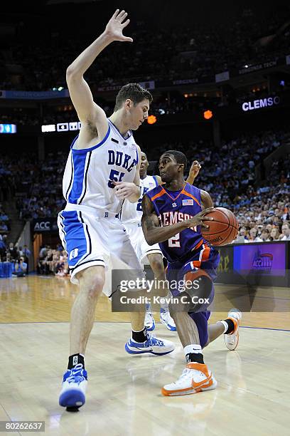 Demontez Stitt of the Clemson Tigers drives on Brian Zoubek of the Duke Blue Devils during the semifinals of the 2008 Men's ACC Basketball Tournament...