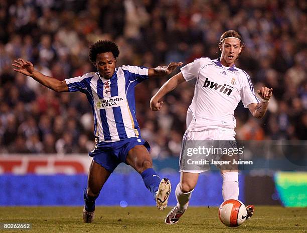 Guti of Real Madrid fights for the ball with Julian De Guzman of Deportivo la Coruna during the La Liga match between Deportivo La Coruna and Real...