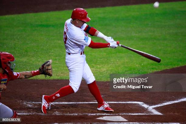 Ramon Urias of Diablos hits the ball during the match between Rojos del Aguila and Diablos Rojos as part of the Liga Mexicana de Beisbol 2017 at Fray...