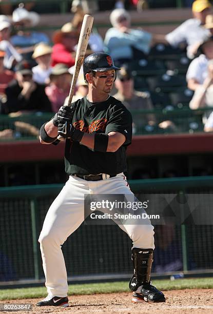 Aaron Rowand of the San Francisco Giants stands ready at bat during the game with the Texas Rangers on March 3, 2008 at Scottsdale Stadium in...