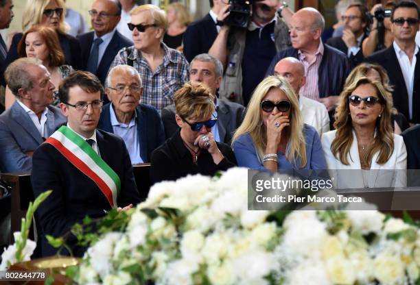Filippo Del Corno, Mara Venier and Silvana Giacobini attend Paolo Limiti funeral services at the church of Santa Maria Goretti on June 28, 2017 in...
