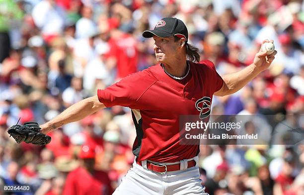 Randy Johnson of the Arizona Diamondbacks pitches during a Spring Training game against the Los Angeles Angels of Anaheim at Tempe Diablo Stadium on...