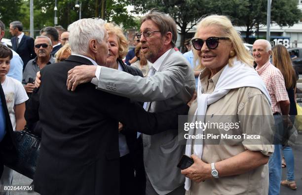 Sandro Mayer and Singer Giovanna attend Paolo Limiti funeral services at the church of Santa Maria Goretti on June 28, 2017 in Milan, Italy. Paolo...