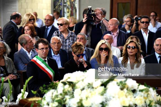 Filippo Del Corno, Mara Venier and Silvana Giacobini attend Paolo Limiti funeral services at the church of Santa Maria Goretti on June 28, 2017 in...