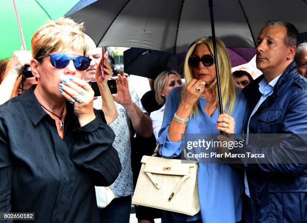 Mara Venier and Manuela Villa leave Paolo Limiti funeral services at the church of Santa Maria Goretti on June 28, 2017 in Milan, Italy. Paolo Limiti...