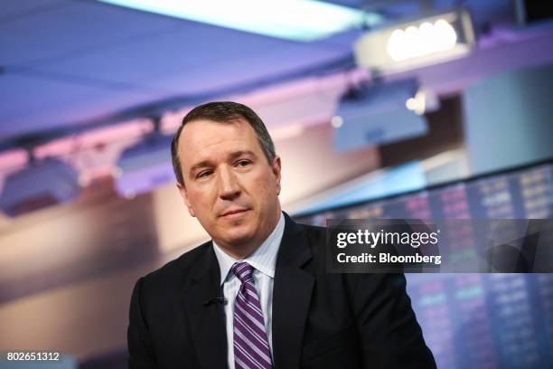 Michael O'Rourke, chief market strategist at Jonestrading Institutional Services LLC, listens during a Bloomberg Television interview in New York,...