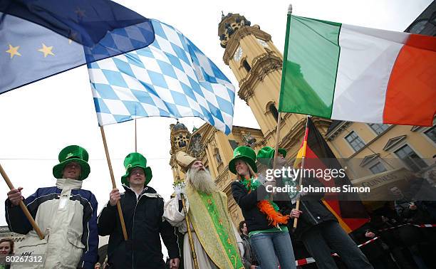 An actor, performing the Irish national Saint St. Patrick, arrives at Odeonsplatz Square during the St.-Patrick's Parade on March 16, 2008 in Munich,...