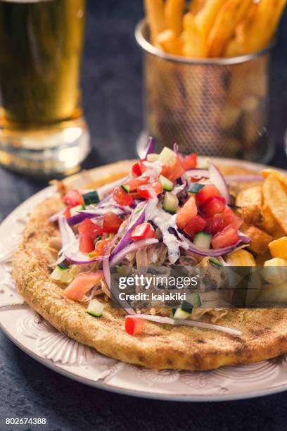 greek gyros with french fries - tzatziki sauce isolated stock pictures, royalty-free photos & images