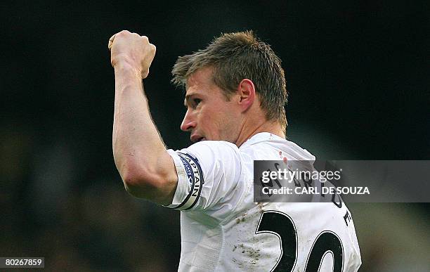 Fulham's Captain Brian McBride celebrates after scoring a goal during a Premiership match against Everton at Fulham's Craven Cottage Stadium on March...