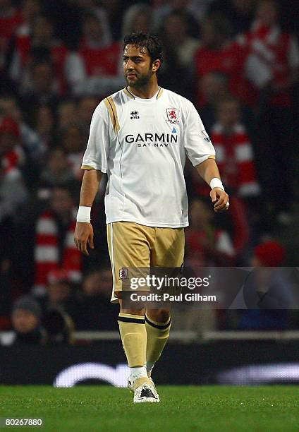 Mido of Middlesbrough walks off the pitch after being shown the red card by referee Mark Halsey after fouling Gael Clichy of Arsenal during the...