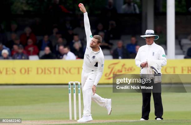 Dawid Malan of Middlesex in bowling action during the Essex v Middlesex - Specsavers County Championship: Division One cricket match at the Cloudfm...