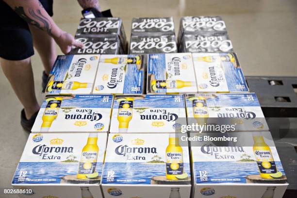 Cases of Constellation Brands Inc. Corona beer sit on a pallet for delivery at the Euclid Beverage LLC warehouse in Peru, Illinois, U.S., on Tuesday,...