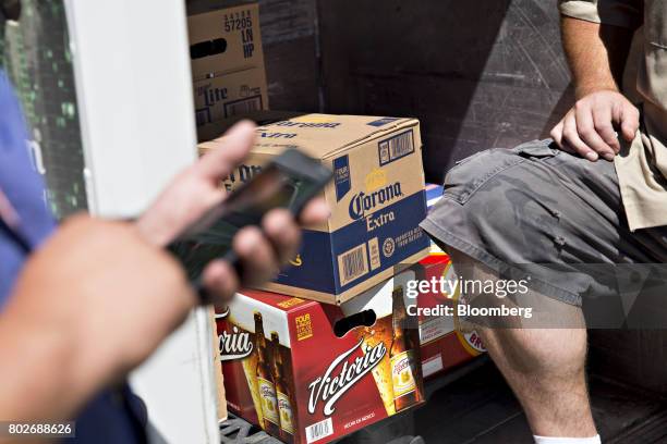 Case of Constellation Brands Inc. Corona beer sits in a truck during a delivery outside a bar in Ottawa, Illinois, U.S., on Tuesday, June 27, 2017....