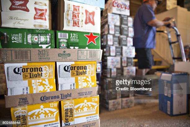 Cases of Constellation Brands Inc. Corona beer sit in a storage room in Ottawa, Illinois, U.S., on Tuesday, June 27, 2017. Constellation Brands Inc....