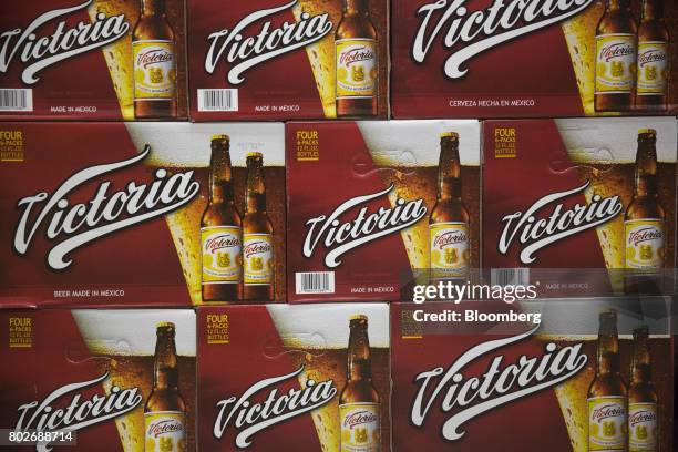 Cases of Constellation Brands Inc. Victoria beer sit inside the Euclid Beverage LLC warehouse in Peru, Illinois, U.S., on Tuesday, June 27, 2017....