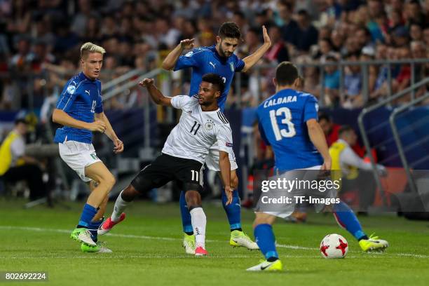 Andrea Conti of Italy Federico Chiesa of Italy Roberto Gagliardini of Italy and Serge Gnabry of Germany battle for the ball during the UEFA U21...