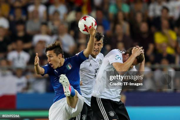 Federico Chiesa of Italy and Yannick Gerhardt of Germany battle for the ball during the UEFA U21 championship match between Italy and Germany at...