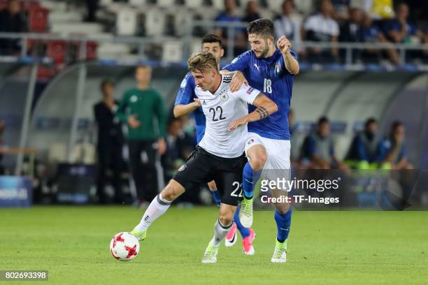 Maximilian Philipp of Germany and Roberto Gagliardini of Italy battle for the ball during the UEFA U21 championship match between Italy and Germany...