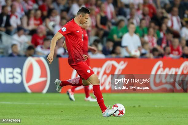 Jaroslaw Jach of Poland in action during the UEFA European Under-21 Championship Group A match between England and Poland at Kielce Stadium on June...