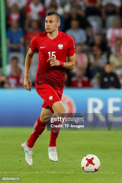 Jaroslaw Jach of Poland in action during the UEFA European Under-21 Championship Group A match between England and Poland at Kielce Stadium on June...