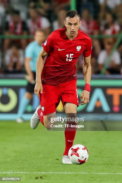 Jaroslaw Jach of Poland in action during the UEFA European Under-21 Championship Group A match between England and Poland at Kielce Stadium on June...