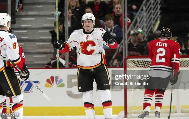 Dion Phaneuf of the Calgary Flames celebrates his second period goal against the Chicago Blackhawks on March 16, 2008 at the United Center in...